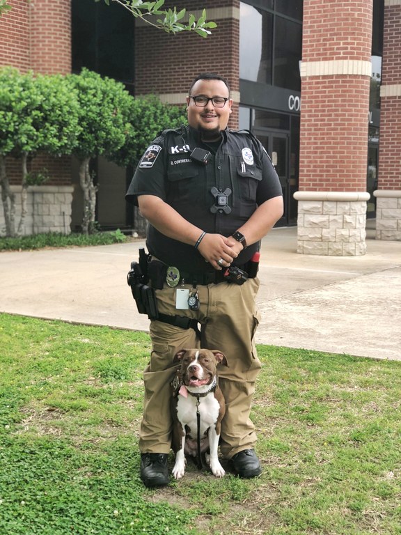 Officer Contreras and Coco.jpeg